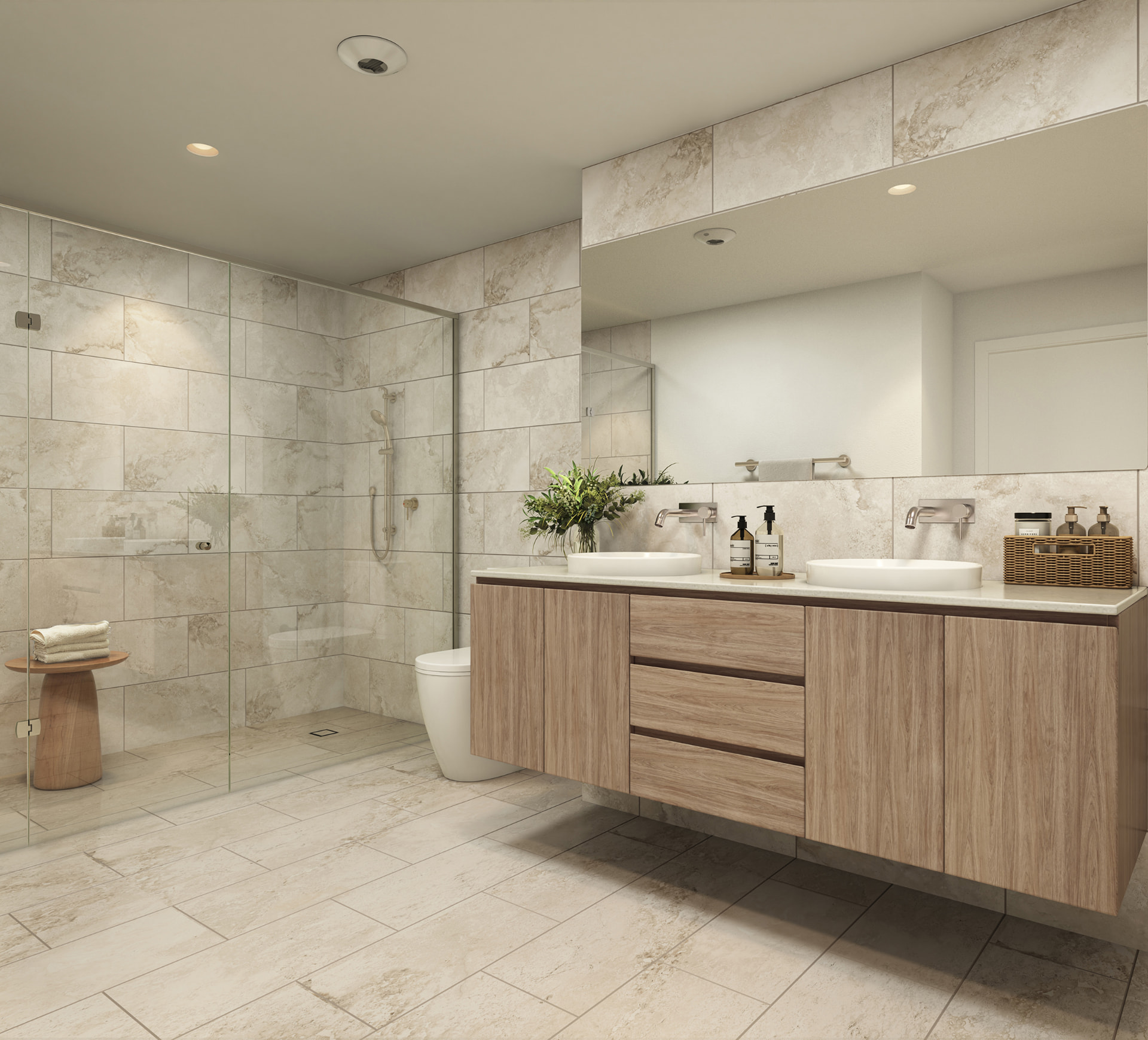Lorimer ensuite bathroom with stone tiling and twin vanity